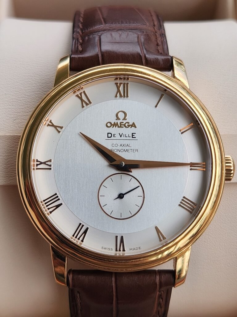 omega Modelo de ville ref. 46143002 de oro 18k. aproximadamente 45 gramos de oro una vez desarmado Movimiento automático coaxial cal 2202 con caja de servicio y documentación original Tamaño 39mm prácticamente nuevo