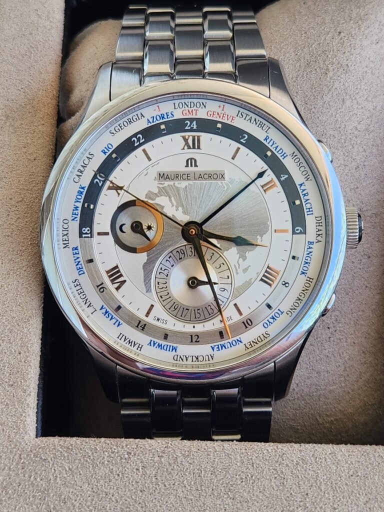 marca maurice lacroix ref MP6008 movimiento automático con hoea mundial, salto de hora, indicador dia y noche, doble husos horarios. movimiento automático cal. ML 164 Tamaño 42mm Con caja y manuales originales.